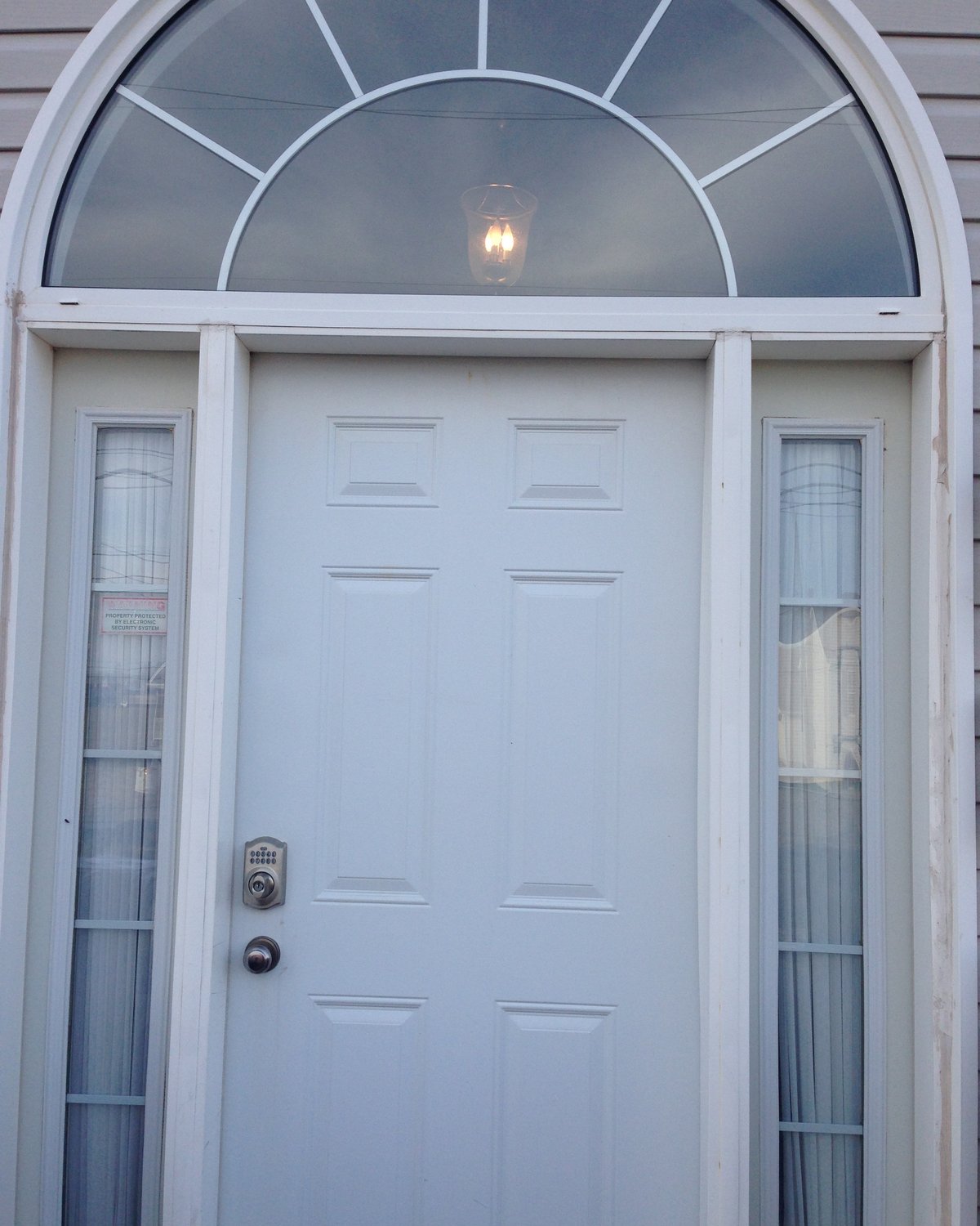 A finished door installation by Maximum Windows and Doors